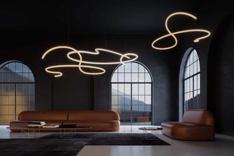 Dark modern living room with tall arched windows, an orange leather sofa, and looping illuminated ceiling sculptures.